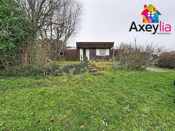 Villerest (42300) A VENDRE - VILLEREST PROCHE BARRAGE - TERRAIN VIABILISÉ DE 1609M2 EN PARTIE CONSTRUCTIBLE AVEC CHALET