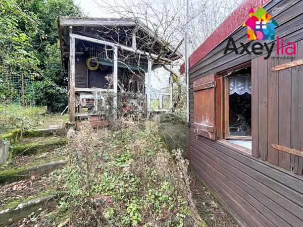 Villerest (42300) A VENDRE - VILLEREST PROCHE BARRAGE - TERRAIN VIABILISÉ DE 1609M2 EN PARTIE CONSTRUCTIBLE AVEC CHALET