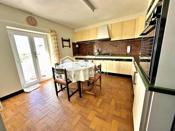 Maison avec combles aménageables, garage, jardin