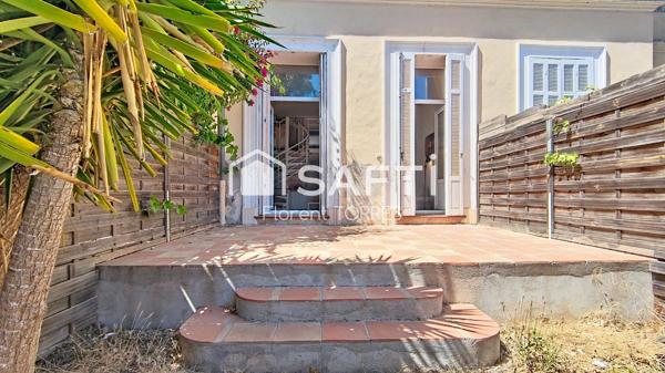 Rez-de-jardin avec terrasse dans une bâtisse emblématique de Tamaris