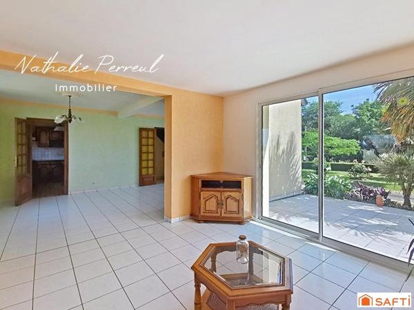 Maison familiale avec grand jardin arboré et sous-sol complet