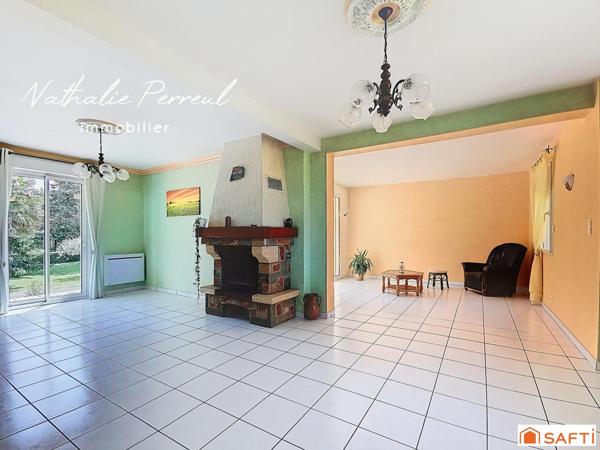 Maison familiale avec grand jardin arboré et sous-sol complet