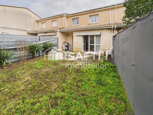 Centre ville, garage, jardin.