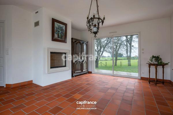 Propriété de plein-pied à fort potentiel — ENVIRONNEMENT PRÉSERVÉ SANS VIS-A-VIS