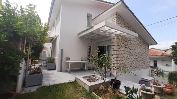 Maison 5 pièce(s) 3 chambre(s) 133 m²