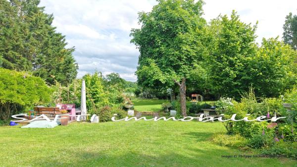 Propriété de 10 pièces, 5 chambres, 2 vérandas, piscine d'intérieur, terrain clos de 3500m2.
