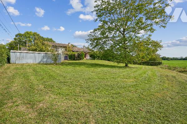 Villa 118 m² sur 1017 m², 5 ch. jardin, 2 garages.