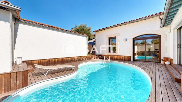 Maison de ville atypique avec piscine et garage – Cœur de ville au calme absolu