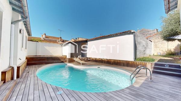 Maison de ville atypique avec piscine et garage – Cœur de ville au calme absolu