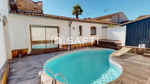 Maison de ville atypique avec piscine et garage – Cœur de ville au calme absolu