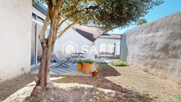 Maison de ville atypique avec piscine et garage – Cœur de ville au calme absolu