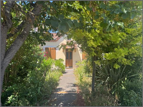 Maison  de 4 chambres avec garage et jardin