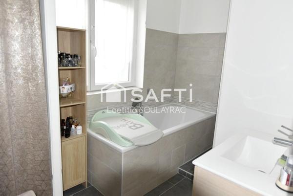 Maison 85 m² proche centre ville, avec garage et jardin.