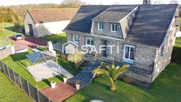 Charmante maison en pierre de 111 m² habitables, 5 pièces spacieuses et lumineuses dans un cadre paisible.