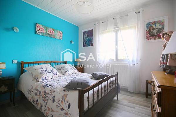 Charmante maison en pierre de 111 m² habitables, 5 pièces spacieuses et lumineuses dans un cadre paisible.