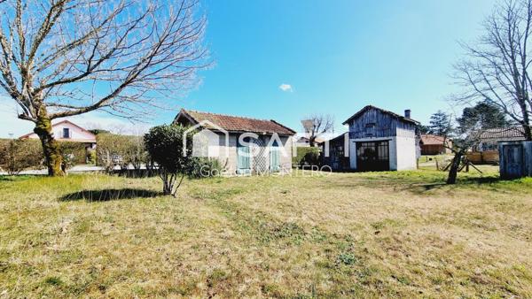 Maison 4 chambres, garage et atelier