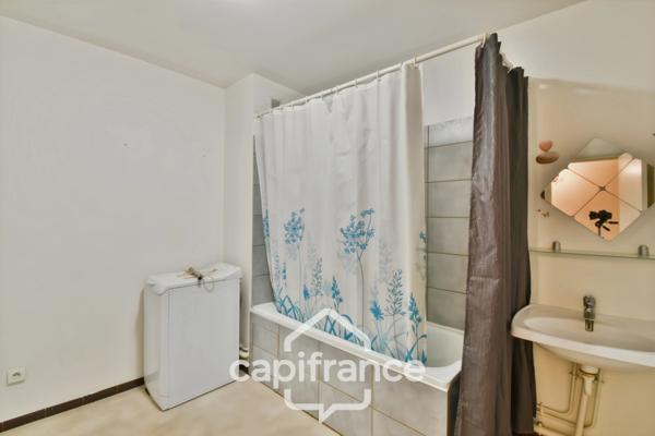 Appartement T4 lumineux avec balcon, et stationnement privatif