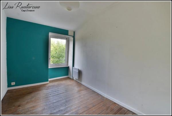 Maison à vendre + Appartement en location - Centre historique de MONTAIGU (85)