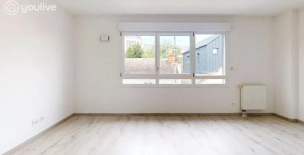 2-pièces lumineux 46 m² – parking, calme et transports à pied