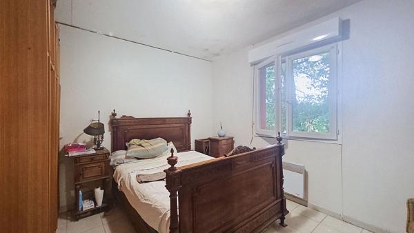 Maison avec jardin vendue louée, avec travaux à prévoir
