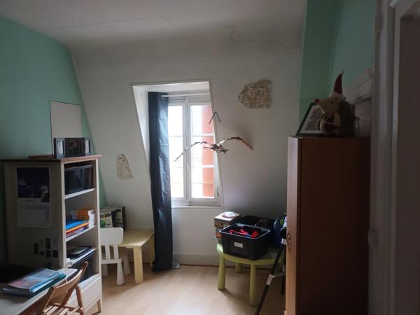 immeuble d'habitation et un local commercial