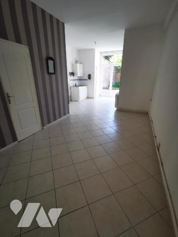 Immeuble de rapport et grande maison à usage d'habitation