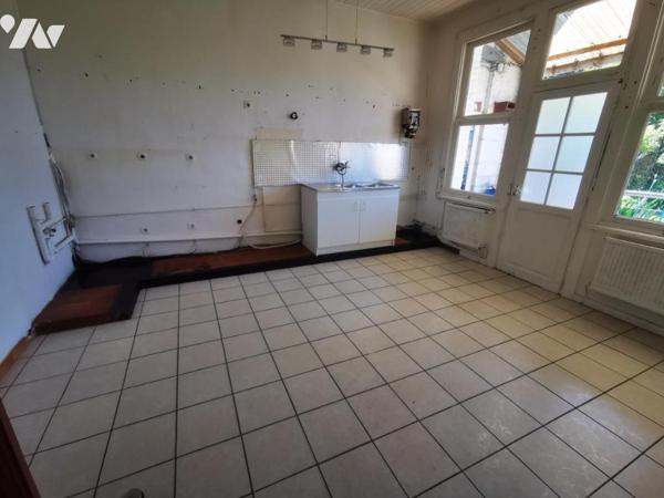 Immeuble de rapport et grande maison à usage d'habitation