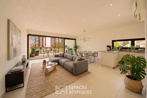 Villa-appartement contemporaine en bord de canal