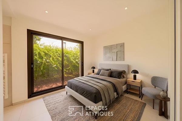 Villa-appartement contemporaine en bord de canal