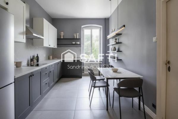Maison mitoyenne avec 4 chambres, jardin et garage!