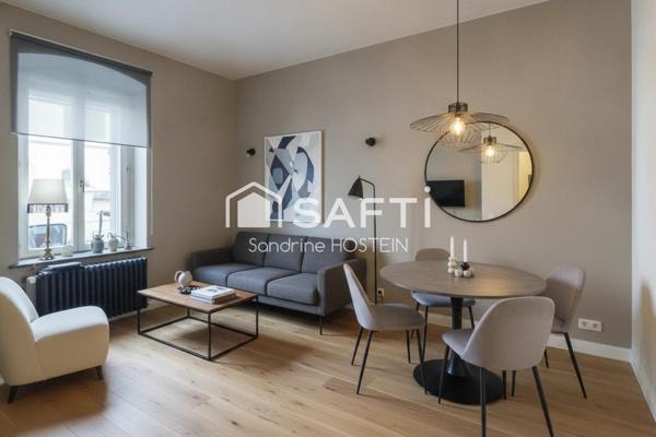 Maison mitoyenne avec 4 chambres, jardin et garage!
