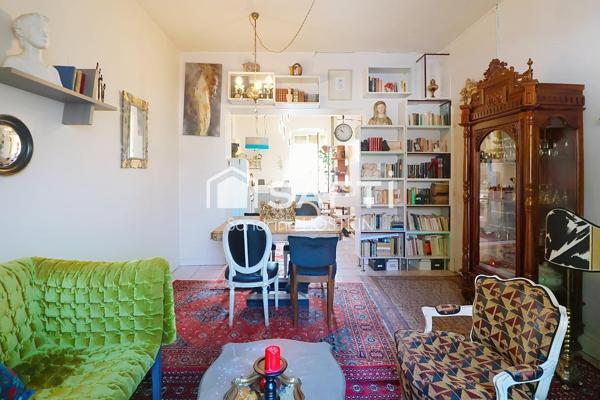 Maison mitoyenne avec 4 chambres, jardin et garage!