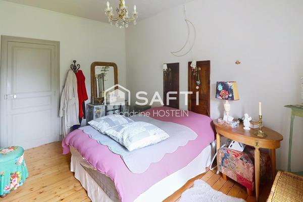 Maison mitoyenne avec 4 chambres, jardin et garage!