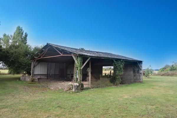 Maison 6 chambres avec nombreuses dépendances sur terrain de 10850m2