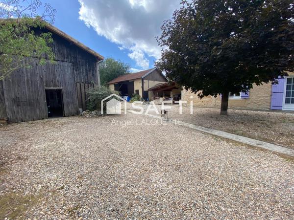 Authentique longère rénovée avec 3 chambres, 2 garages et terrasse couverte !