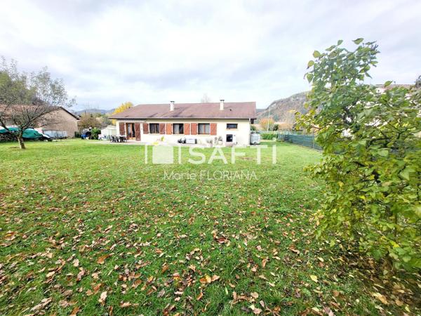 Maison plain-pied avec joli terrain