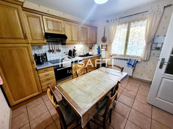 Maison plain-pied avec joli terrain