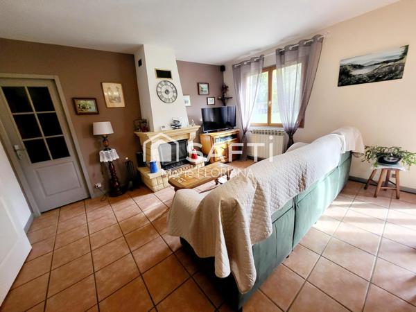 Maison plain-pied avec joli terrain