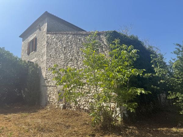 Montaigu-de-Quercy (82150) MONTAIGU DE QUERCY Maison en pierre au village avec 2 chambres, dépendants et 4033m2 de te