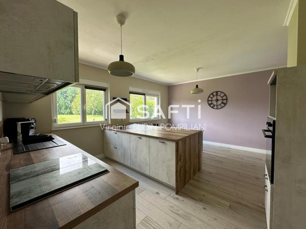 Maison individuelle plain-pied avec jardin et garage