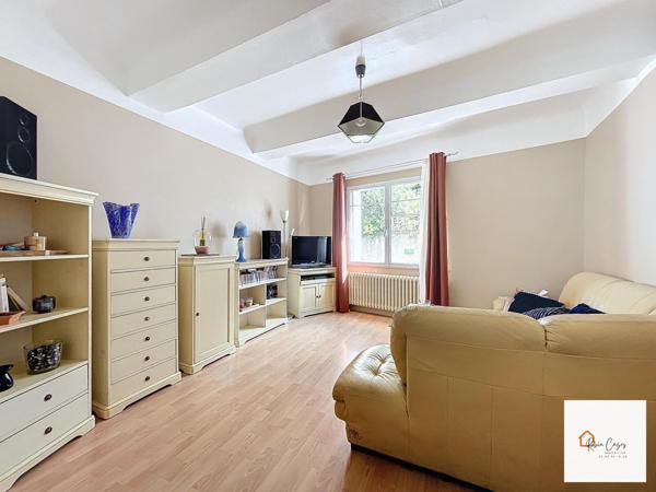 Maison T7 de 160m² avec jardin, caves et garages