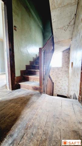 Maison de 117m2 avec jardinet à rénover au centre-ville