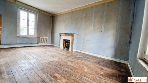 Maison de 117m2 avec jardinet à rénover au centre-ville