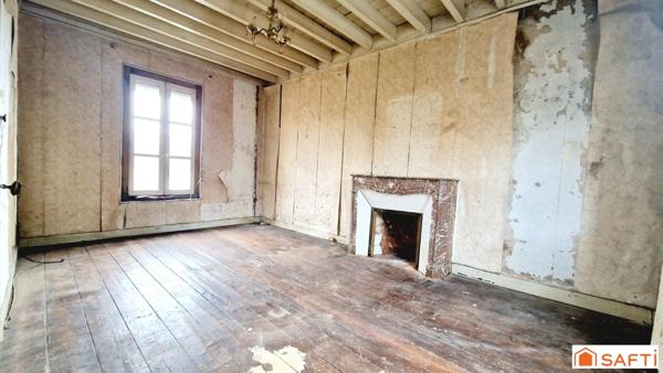 Maison de 117m2 avec jardinet à rénover au centre-ville