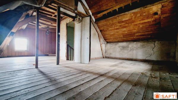 Maison de 117m2 avec jardinet à rénover au centre-ville