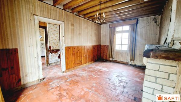 Maison de 117m2 avec jardinet à rénover au centre-ville