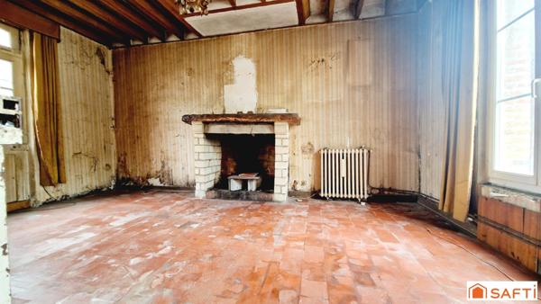 Maison de 117m2 avec jardinet à rénover au centre-ville