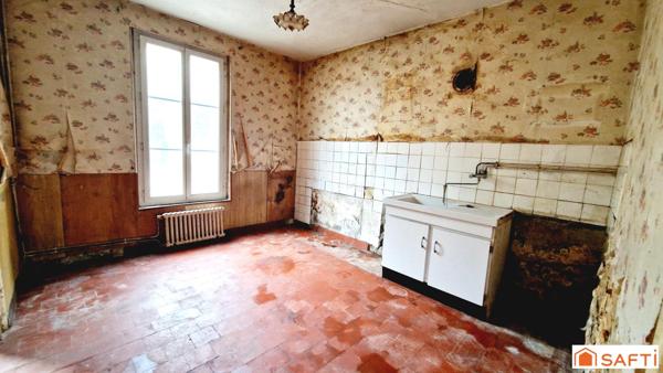 Maison de 117m2 avec jardinet à rénover au centre-ville