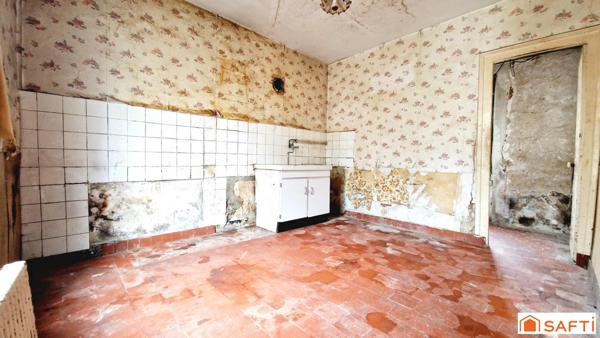 Maison de 117m2 avec jardinet à rénover au centre-ville
