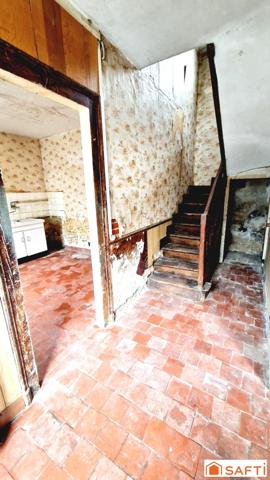 Maison de 117m2 avec jardinet à rénover au centre-ville